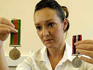 Supporting image for story: Appeal over medals owner