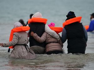 Supporting image for story: 75 migrants deported to France and 51 allowed into UK under deal