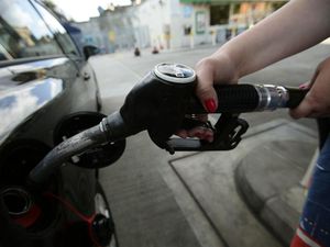 Supporting image for story: MPs call for measures to stop fuel stations overcharging customers