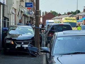 Supporting image for story: Man stabbed as taxi abandoned in Tipton violence