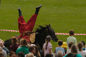 One of the Ukrainian Cossacks flipping beneath a galloping horse. Image by Andy Compton
