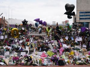 Supporting image for story: Man charged in connection with theft of flowers from Ozzy Osbourne tribute