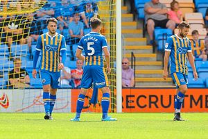 A dejected Kieran Kennedy of Shrewsbury Town after Bradford take the lead. (AMA)
