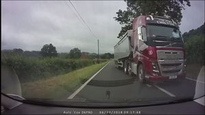 The lorry pulls back to the left lane