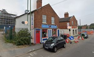 Historic England is negotiating with the owners of the Chilli Spice and Spring Garden takeaways. Photo: Google