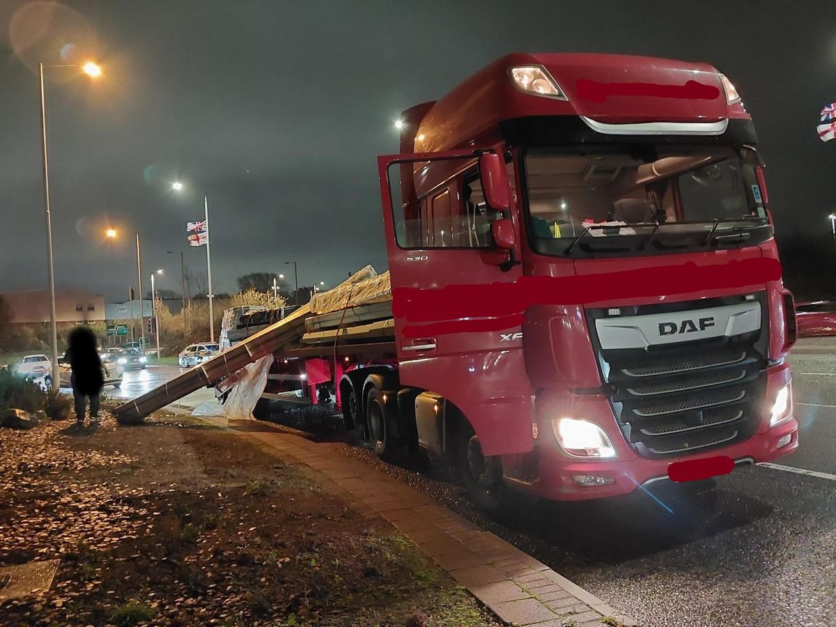 Lorry shed load on busy Oldbury island in front of traffic cops Lorry shed load on busy Oldbury island in front of traffic cops