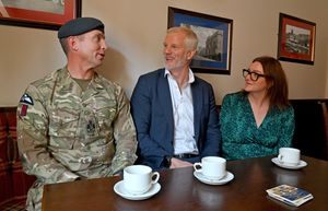 Armed forces minister Al Carns, chats to Warrant Officer Wesley Conabeare and Stafford MP Leigh Ingham during his visit to the Bird in Hand pub, Stafford.