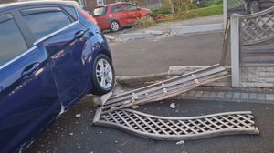 Cars and fences were hit directly but even that didn't stop the truck 