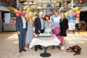 John Shotton, Natalie Shotton (John's daughter), Robert Shotton, Ellen Shotton (Robert's wife), Oliver Shotton (John's son), Malin Shotton (John's wife) and Sadie the dog - celebrating 40 years of Cousins Furniture at the Tyseley showroom