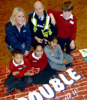 2009: PCSO Tim Littlehales with Gemma Sifleet, Jack Webb, Joesph Reid, Zahra Bashir and Humayra Luqman at Caldmore School