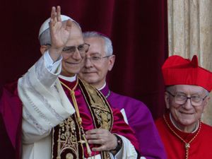 Leo XIV waves at the Vatican