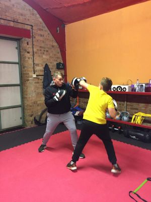 Daniel Bailey at Fort Boxing Club with some of the children