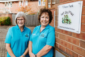 Chair of Trustees Joyce Jeavons and Charity Manager Kim Hatton celebrate Let Us Play winning a Queen's Award for Voluntary Service