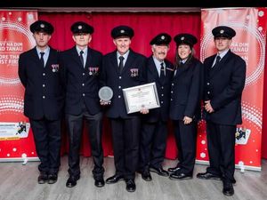 Supporting image for story: Presteigne Fire Station has won the top fundraiser award at a Mid and West Wales Fire Service ceremony
