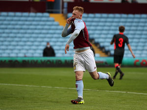 Supporting image for story: More to come from TNS striker Brad Young insists Craig Harrison