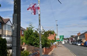 DUDLEY COPYRIGHT NATIONAL WORLD STEVE LEATH 21/08/25Flags and an island were decorated in the Stourbridge area. This is approaching Wollaston's main shopping street.