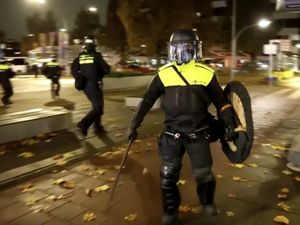 Supporting image for story: Amsterdam police warn of fresh calls for unrest a day after rioters torch tram