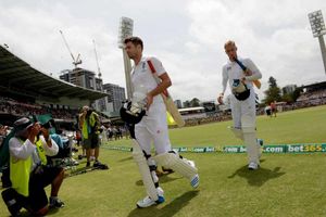 England's James Anderson (left) and Stuart Broad (right) leave the field following their loss of the match and the Ashes