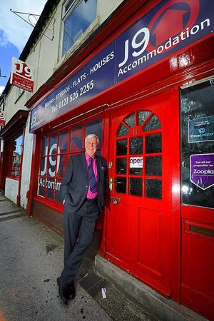 Jim next to his J9 offices in Walsall Road, Darlaston