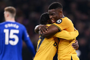 Marshall Munetsi of Wolverhampton Wanderers celebrates scoring his team's first goal with teammate Jean-Ricner Bellegarde  (Photo by Gareth Copley/Getty Images)