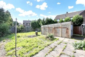 The property's rear garden. The home has a guide price of £90,000. Picture: Rightmove/McHugh & Co.