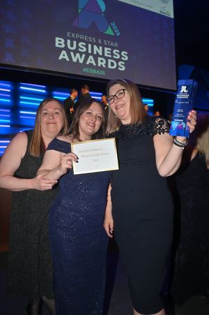 Walsave Credit Union's Diane Hassell, Kim Lote and Sarah Lote celebrate winning the Business of the Year Award