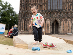 Supporting image for story: Landlocked cathedral welcomes in the seaside with return of handmade beach event