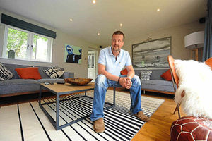 Joe Grafton, in the living room of his home, at Hopesay which was transformed by the BBC One show DIY SOS