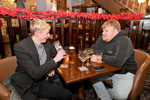 Alex Raybould and Owen Robinson having a drink