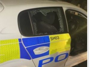 Supporting image for story: Brick thrown at officer's head through car window
