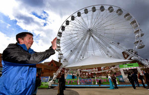 Dudley Business Group committee member Steve Parker gives the wheel a 'push' as it prepares to leave Dudley