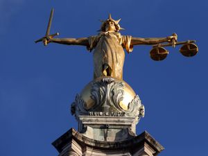 The Statue of Justice stands atop the Old Bailey