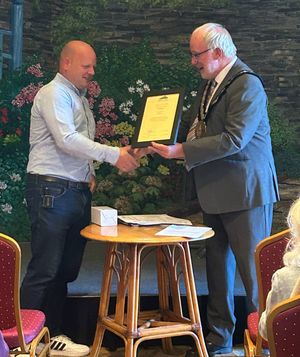 Kington's 'go to' man presented with the Mayor's Special Award by Kington Mayor Councillor Philip Sell