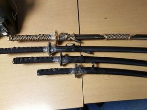 Supporting image for story: Man hands samurai swords in to police 