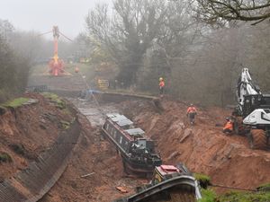 Supporting image for story: Whitchurch canal collapse: Watch as boat winched clear of massive hole weeks after dramatic breach