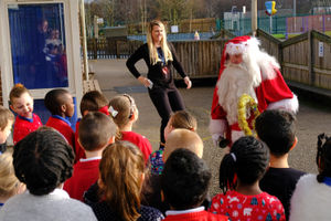 The longest serving Santa Ray Hulse, 76 from Bridgenorth has paid a socially distanced visit to Windmill Primary School in Telford to deliver goodies to the excited children.