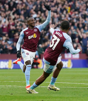Aston Villa's Moussa Diaby (left) celebrates scoring the opening goal 