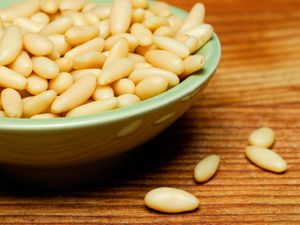 Supporting image for story: Pine nuts and goats milk should be on food allergy lists, researchers say