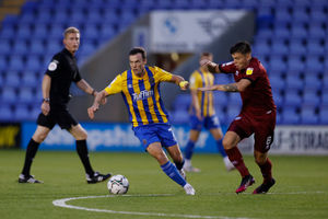 Shaun Whalley of Shrewsbury Town and Aaron Morley of Rochdale (AMA)