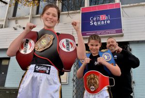 Rising kickboxing stars, Lilimae Marson, 14, and Molli Marson 12, at Central Square Nightclub which is the base for JL Security who have sponsored the girls. Pictured with them is Paul Lucas