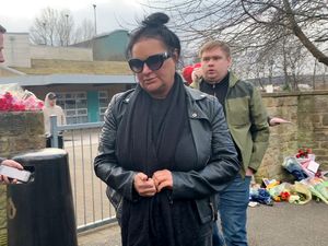 Supporting image for story: Family of boy, 15, killed in Sheffield school stabbing visit scene