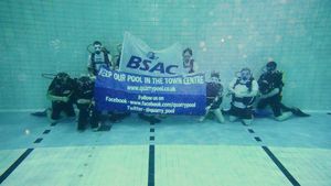 Supporting image for story: 'No one at the end of life should worry about getting the compassion and dignity they deserve' - Your Letters and a sub aqua club’s deep-end protest for the Quarry Pool in a picture from our archive