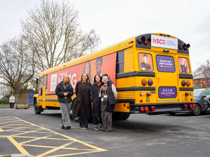 Supporting image for story: Big yellow bus brings NSCG to schools across the region