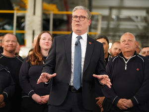 Prime Minister Sir Keir Starmer speaks to employees at a car factory in the West Midlands on Thursday May 8, 2025. 