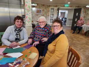 Residents and guests at HC-One’s Foley Grange Care Home crafting Christmas cards