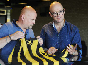 Steve Plant, of Stourbridge, shows antiques expert David Harper, a Wolves shirt dating back to 1910