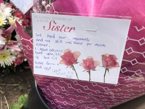 A tribute left from the victim's sister at the scene