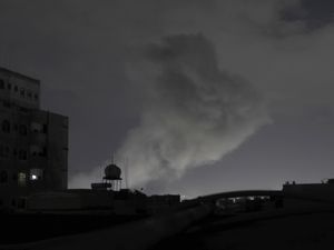 Smoke rises from a location reportedly struck by US airstrikes in Sanaa, Yemen