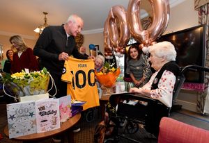 Joan was presented with a special jersey to commemorate the special occasion. 