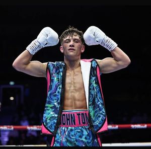 Supporting image for story: Lives in Morecambe, trains in Walsall, wins in Manchester